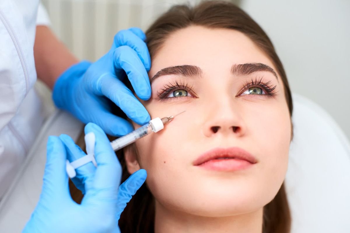 Revanesse Versa hyaluronic acid dermal filler syringe on a clean clinical surface — buy revanesse versa online from a trusted aesthetic supplier