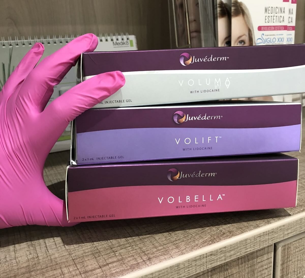 Woman receiving Juvederm hyaluronic acid filler treatment at aesthetic clinic