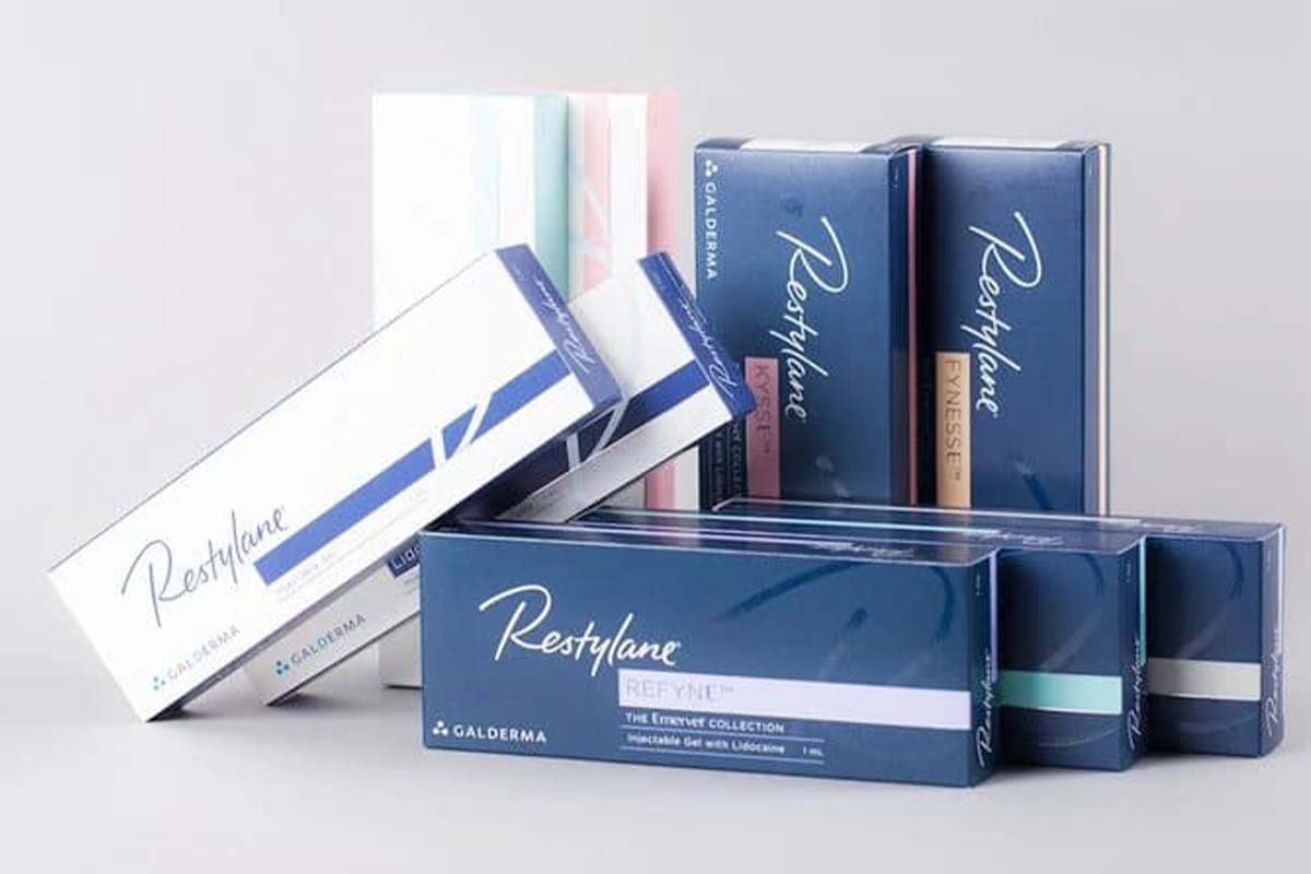 Medical professional reviewing Restylane dermal filler products to buy restylane online for aesthetic clinic supply